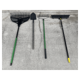 Garage… Assorted yard tools to include rakes, push broom, and spade shovel. See pictures for details.