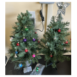 Garage… Mini table top Christmas trees, set of two, see pictures for details.