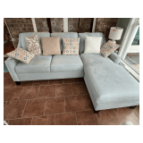 SUN… Plush, light blue sofa group with chaise lounger, sofa pulls out into a bed, comes with seven accent pillows, see pictures for details.