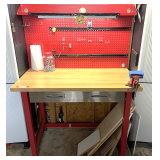 Shed… UltraHD metal framed workbench, has metal pegboard back, and pull out drawer with some content, see pictures for details.