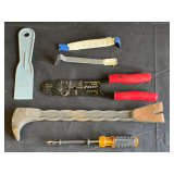 Garage… Assortment of hand tools to include wire strippers, flat bar, small prybar/puller, and more. Tub is not included, see pictures for details.