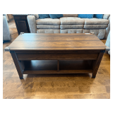 LR…Wood look lift top coffee table with bottom shelf storage, see pictures for details.