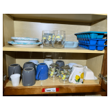 KIT… Shelf lot marked 1098 of content of bottom two shelves, includes glassware, coffee mugs, butter dish, and more. See pictures for details. ￼