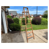 Garage… 8 foot wooden step ladder, see pictures for details.
