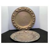 Vintage hand hammered copper plaque featuring an Aztec Mayan sun calendar design, also included is a vintage copper or brass charger (decorative plate) featuring a repoussé and chased rim with a frui