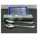 Six piece knife set, and two piece silver plated spoon and fork set, both come in original boxes, see pictures for details.