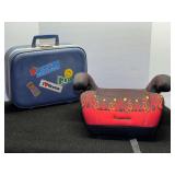 Child’s car booster seat, and child’s small suitcase. See pictures for details.