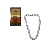 Carved Jade Owl Pendant Necklace and Blue and White Porcelain knotted Bead Necklace
