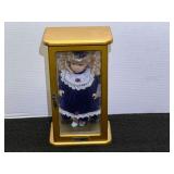 Collectible doll in display case, see pictures for details.