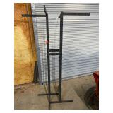 Four-sided retail display unit. Some people do repurpose this item for hanging and spraying parts in their shop. See pictures for details