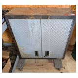 Gladiator metal tool cabinet, comes with some content, and furniture dolly. See pictures for details.