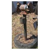 8” bench grinder mounted on a tire base, working condition unknown, see pictures for details.