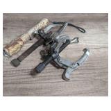 Pullers, two pieces, also includes a tactical flashlight, cardboard bin is not included, see pictures or details.