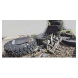 Large 16.0 0 R20, with rims, and more. Approximately 14 tires total. See pictures for details.