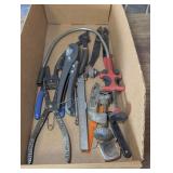Assorted items to include wire stripper, pipe cutters, gauge, and more. Cardboard bin is not included. See pictures or details.