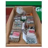 Assorted fasteners, cardboard bin is not included, see pictures for details.