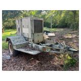 Large military generator mounted on heavy duty trailer, working condition unknown, see pictures for details.