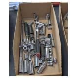 Socket assortment, Snap-On ratchet, Snap-On flex head ratchet, extensions, and more. Cardboard bin is not included. See pictures for details.