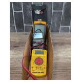 Assorted digital multimeters, also includes a vintage analog volt-ohm-milliammeter that comes with a leather storage case. Cardboard bin is not included, see pictures for details.