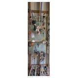 Hardware, Automotive Parts, and More Hanging in Wall Area and Floor Beneath Marked 5004