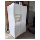 GE side by side refrigerator freezer with door ice and water