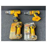 D2-DeWalt 9.6 V, and 14.4 V cordless drills, The 14.4 V has no battery, working condition unknown on these items, also comes with two energizer flashlights. See pictures for details.
