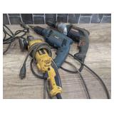 Craftsman half inch electric drill, Makita 1/2”electric drill, and DeWalt 4 1/2” angle grinder, cardboard bin is not included, these items power up, see pictures for details.
