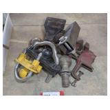 Ball hitches, receiver hitch extension, small table vise, and hitch locks. See pictures for details.