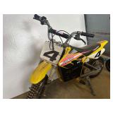 Yellow Razor Dirt Rocket MX650 Electric Motocross Bike, a high-performance 36V electric ride-on designed for off-road use. Working condition unknown