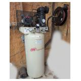 Ingersoll rand shop compressor, model SS5, comes with large hose reel and fittings. See pictures for details.