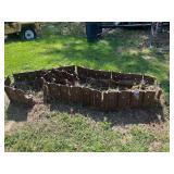 Rusted steel track chain and grousers (pads) from a heavy crawler vehicle, see pictures for details.