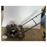 Bolens brand 20" mower with Briggs & Stratton engine. Engine is not locked up. Working condition unknown