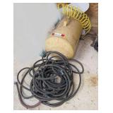 Central pneumatic 11 gallon portable air tank, comes with air hose. See pictures for details.