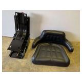 D3 – Black Talon black vinyl tractor suspension seat with an adjustable mechanical suspension base and ribbed cushion design, appears to have never been used, see pictures for details.