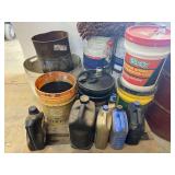 PALLET WITH 4 Drums of 5 gallon U4.4 Racing fuel. Two are partial cans, also various containers of motor oil