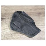 Soft sided pistol holster, see pictures for details.
