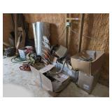 Large miscellaneous lot of assorted items to include duct insulation wrap, T-posts, Echo and Poulan chainsaws, working condition unknown, sign holder, high Bay light, and much more. See pictures for d