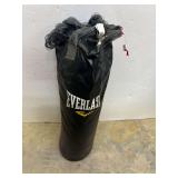 EVERLAST WORK OUT PUNCHING BAG. APPROXIMATELY 3 FOOT TALL. IT IS A HANGING BAG.
