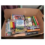 Box Lot of Assorted Fiction Novels, VHS Tapes, and Miscellaneous Items
