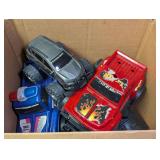 Mixed Toy Vehicles Lot Including Monster Trucks and Cars