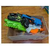 Assorted Nerf Blasters, Nerf Water Shoes, and Large Building Blocks
