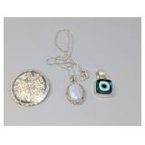 Collection of Three Sterling Silver Jewelry Pieces Including Brooch and Pendants