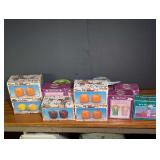 Assorted Ceramic Salt and Pepper Shakers in Original Boxes