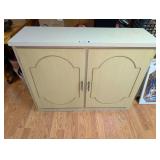 Two-Door Storage Cabinet with Light Finish and Interior Shelving