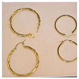 Classic Gold-Tone Twisted Hoop Earrings and Smaller Smooth Round Hoops.