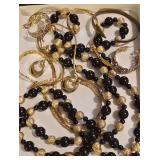 Vintage Triple-Strand Black and Gold-Tone Necklace and Costume Jewelry Lot Including Gold Tone Chain, Brass Cuff Bracelet and More.