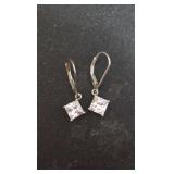 Princess-Cut Sterling Silver Cubic Zirconia Dangle Earrings with a Secure Leverback Closure.