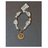 Designer Gold-Tone and Faux Baroque Pearl Stretch Bracelet with Sunburst Charm