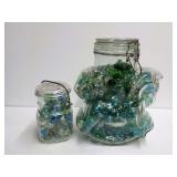 Two Glass Jars Filled with Decorative Glass Gems and Marbles