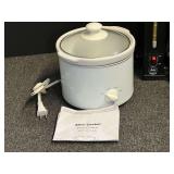 Small kitchen appliances to include an Oster electric fry pan, a small slow cooker with lift out crock, and a small 4 cup drip coffee pot. These items power up, see pictures for details.